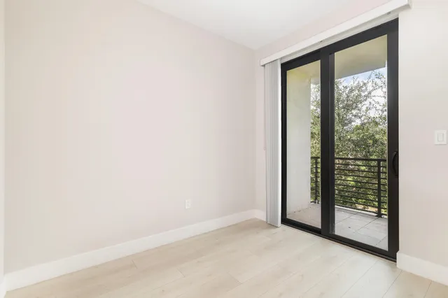 a view of a room with a large window