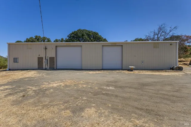 a house view with a backyard space