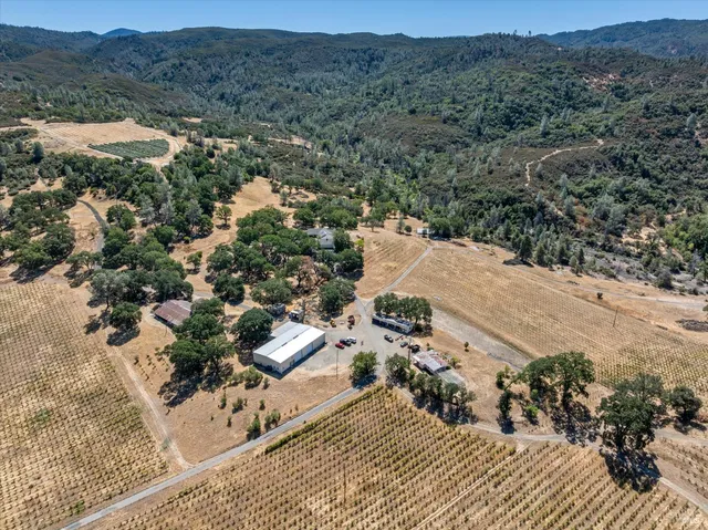an aerial view of a town with couple of houses