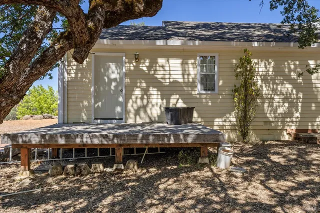 a large building with a lot of trees in front of it