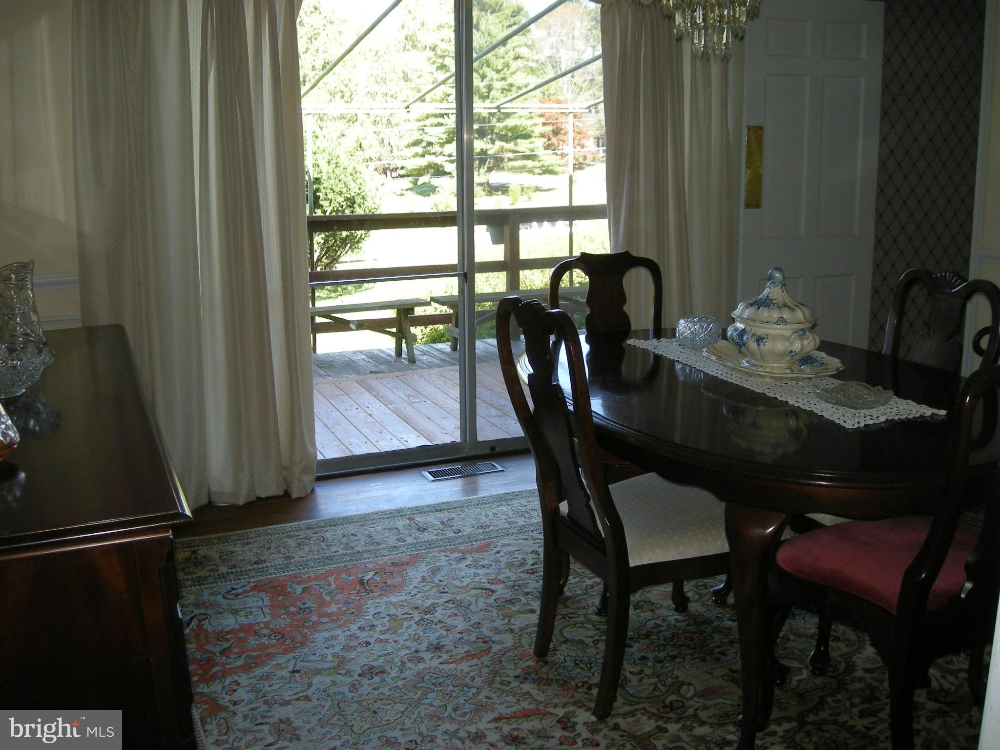2708 Jerusalem Road Kingsville, MD 21087 - Photo 16 of 26 Dining Room & Sliding Glass Door to Deck