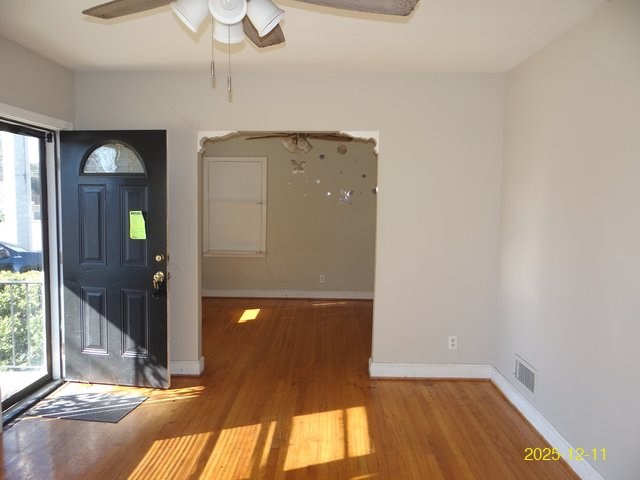 3639 St Marys Road Columbus, GA 31906 - Photo 4 of 13 a view of a livingroom with a fireplace and wooden floor
