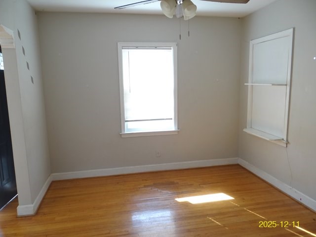 3639 St Marys Road Columbus, GA 31906 - Photo 6 of 13 wooden floor in an empty room with a window
