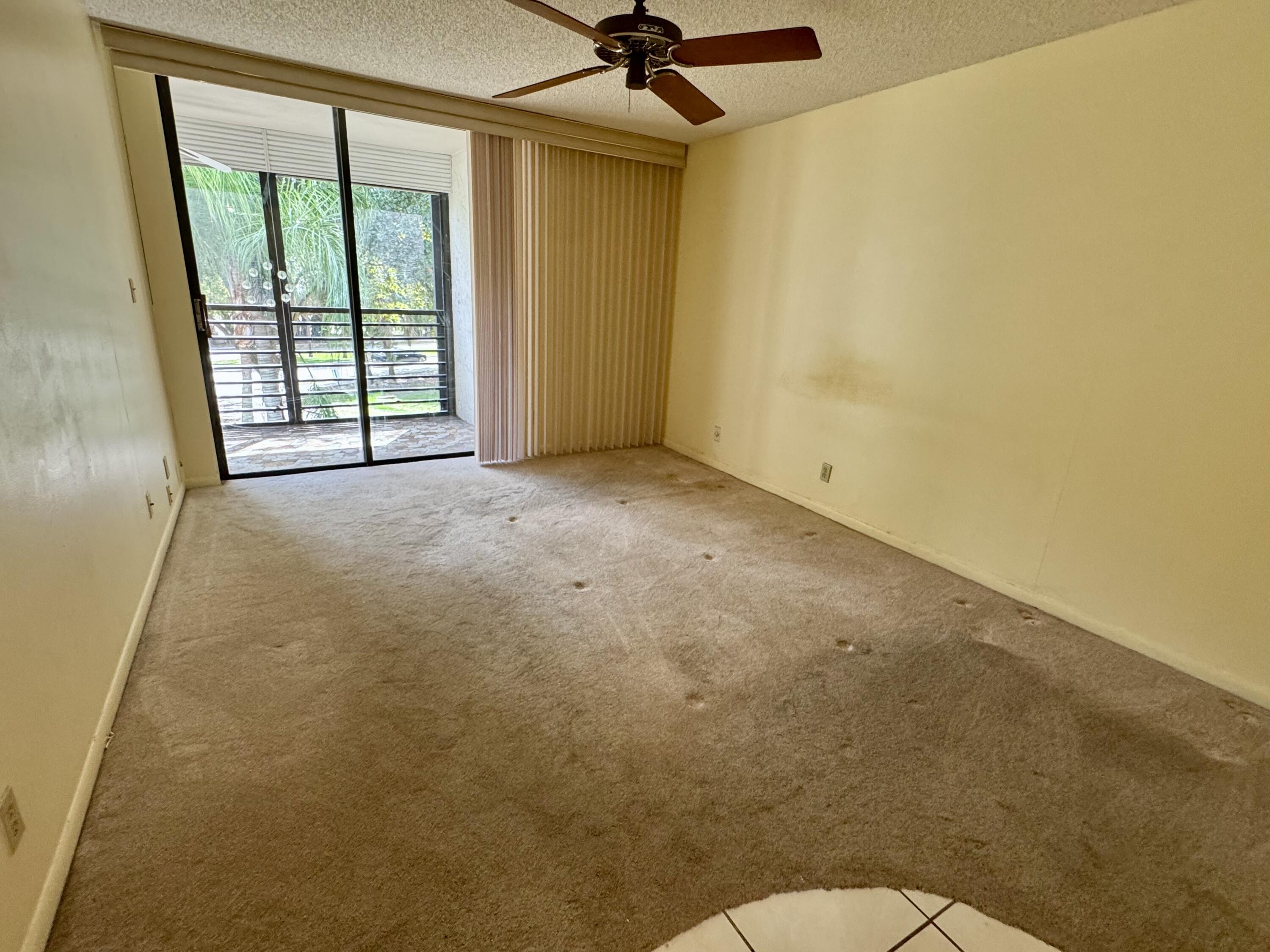 8050 West McNab Road, Unit 320 Tamarac, FL 33321 - Photo 11 of 24 a view of a room with a window