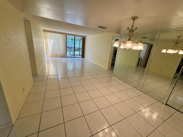 a view of a livingroom and window