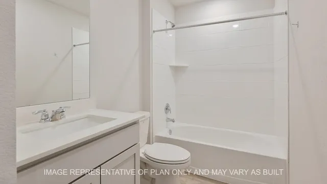 a bathroom with a sink a toilet and a bathtub