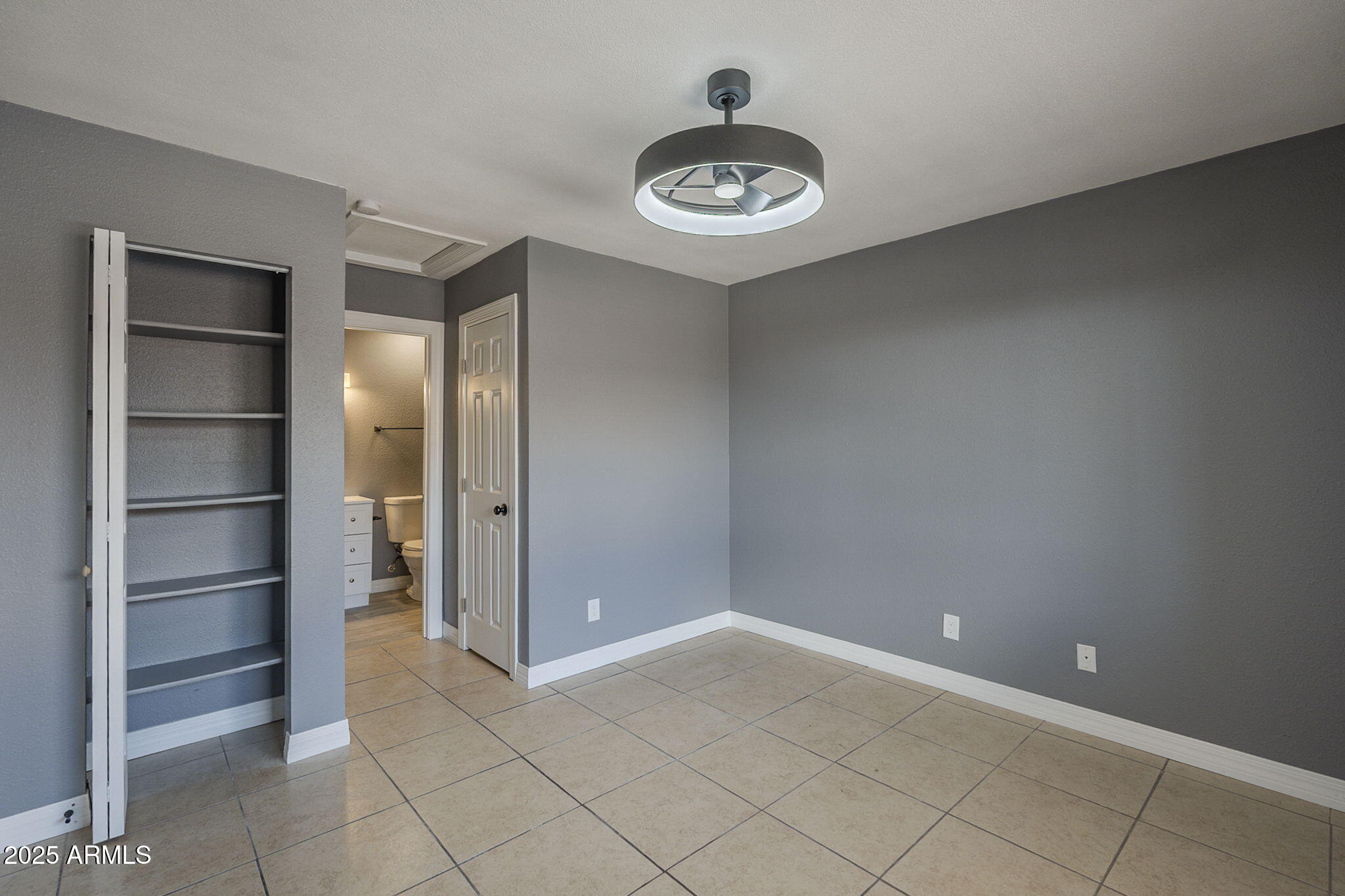 3511 East Baseline Road, Unit 1033 Phoenix, AZ 85042 - Photo 21 of 27 a view of an empty room and a window