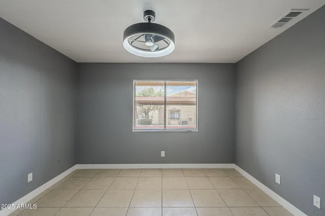 a bathroom with a toilet a sink a shower and vanity