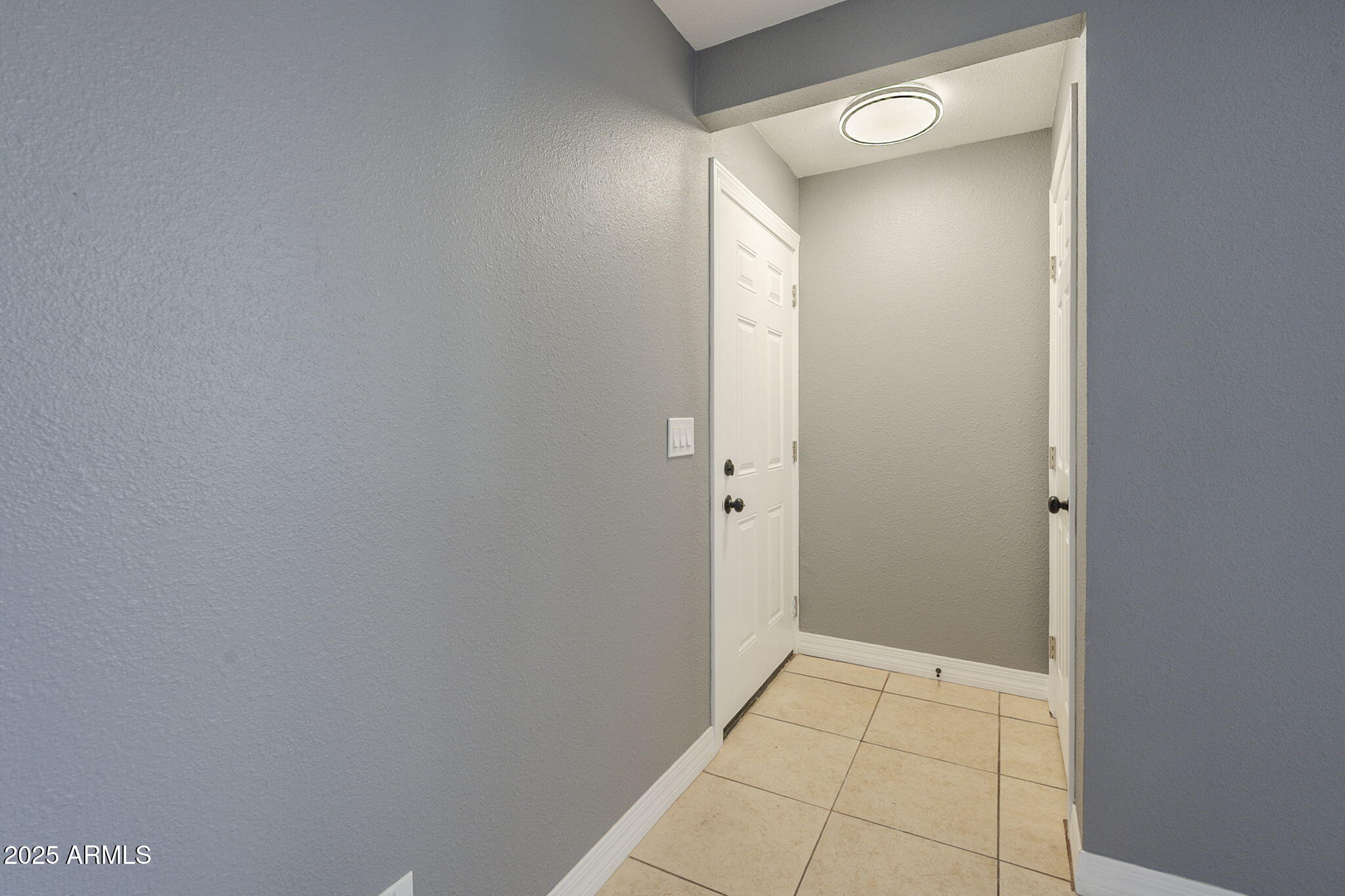 3511 East Baseline Road, Unit 1033 Phoenix, AZ 85042 - Photo 4 of 27 a view of an empty room