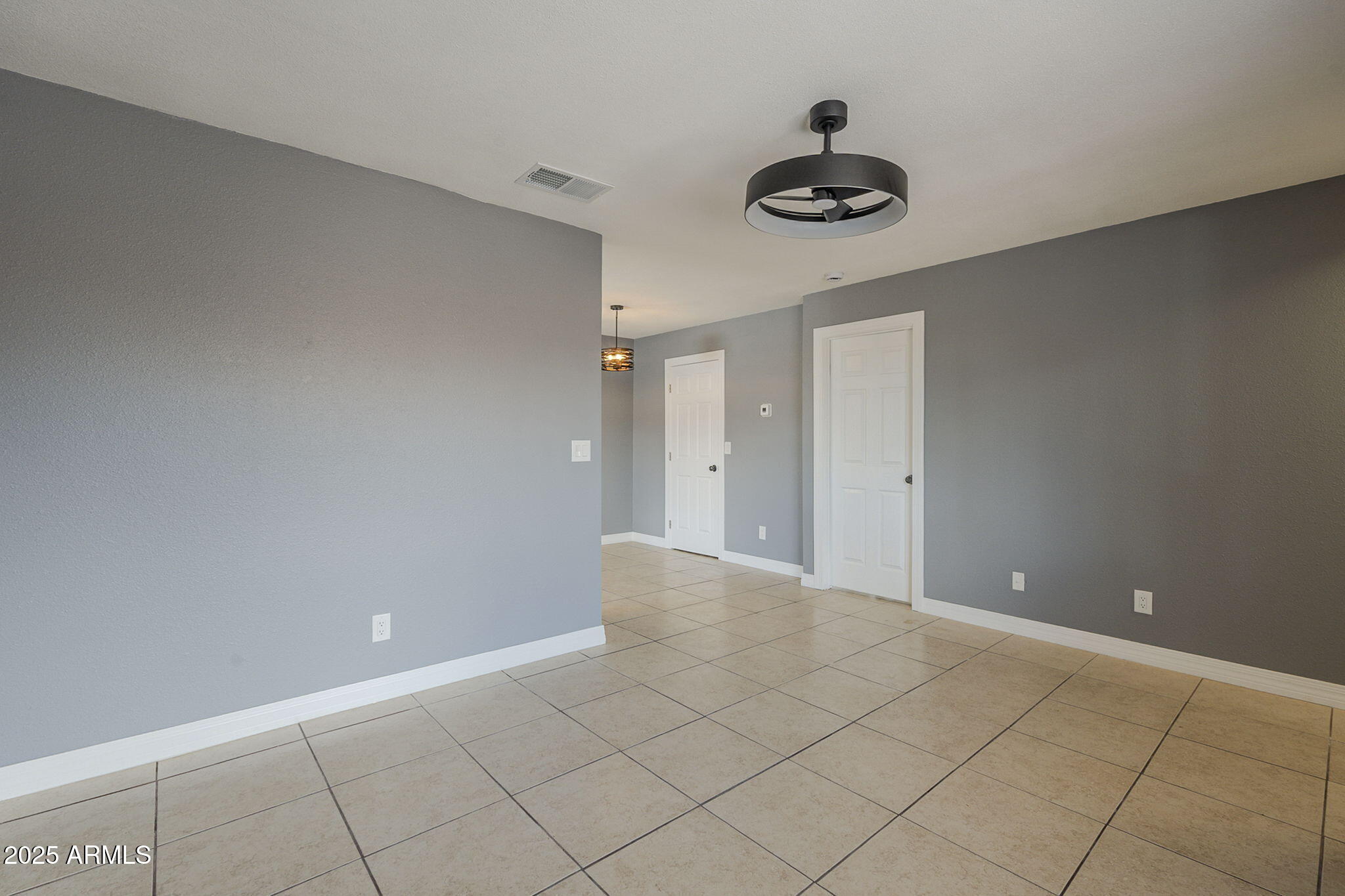 3511 East Baseline Road, Unit 1033 Phoenix, AZ 85042 - Photo 7 of 27 a view of an empty room