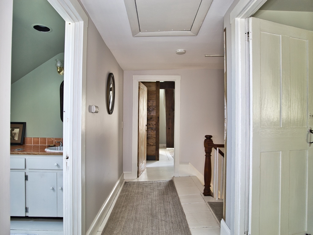 56 Maple Avenue Little Compton, RI 02837 - Photo 19 of 33 a view of a bathroom with a bathroom