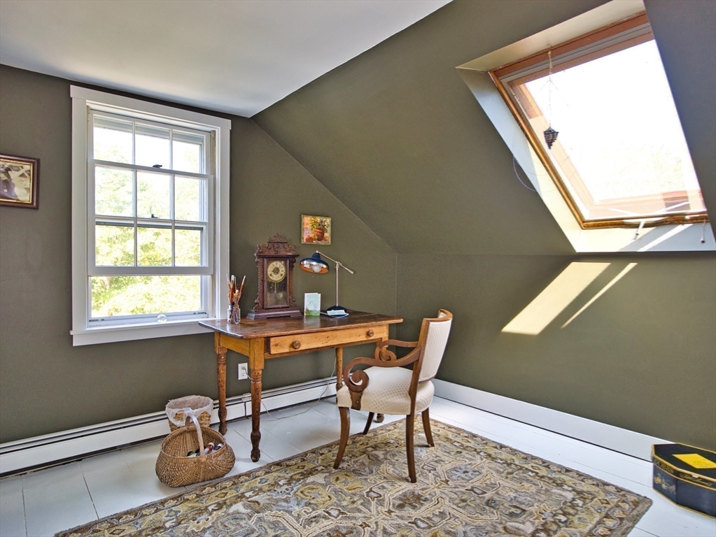 56 Maple Avenue Little Compton, RI 02837 - Photo 23 of 33 a bedroom with furniture and a window