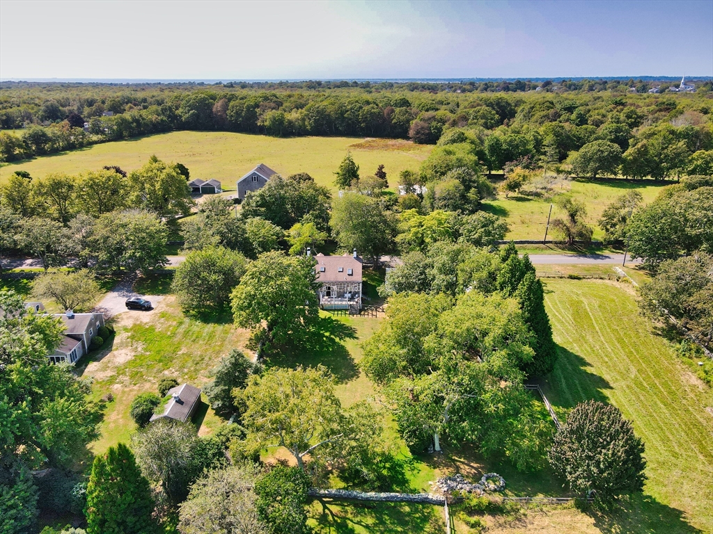 56 Maple Avenue Little Compton, RI 02837 - Photo 32 of 33 an aerial view of a residential houses with outdoor space and trees all around