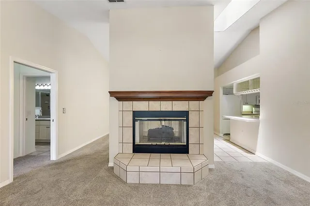 a living room with a fireplace