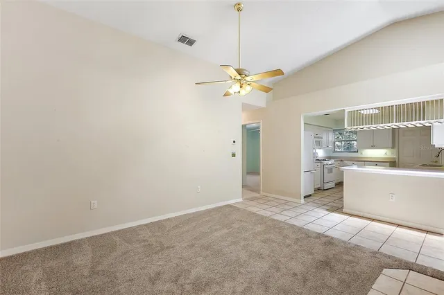 a view of a kitchen with a sink