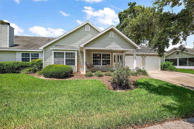a view of a house and garden