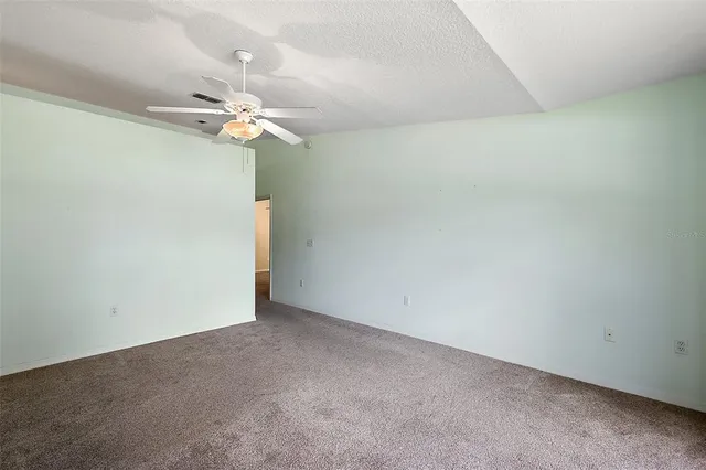 a view of a small space with a fan