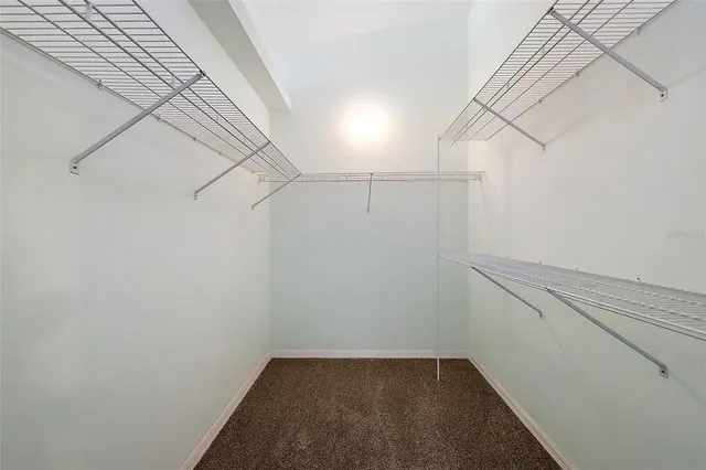 a view of a room with racks on the wall