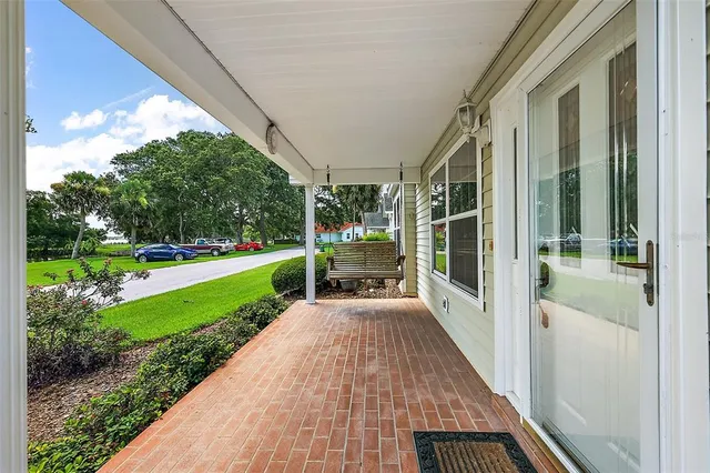a view of a porch with garden