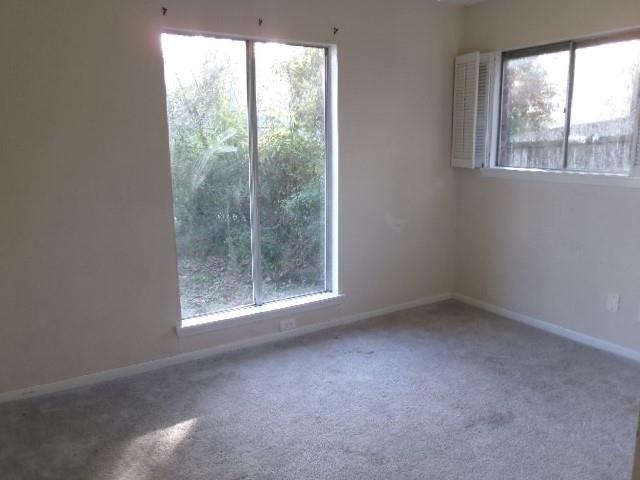 9146 Kingston Road Shreveport, LA 71118 - Photo 14 of 14 an empty room with a window