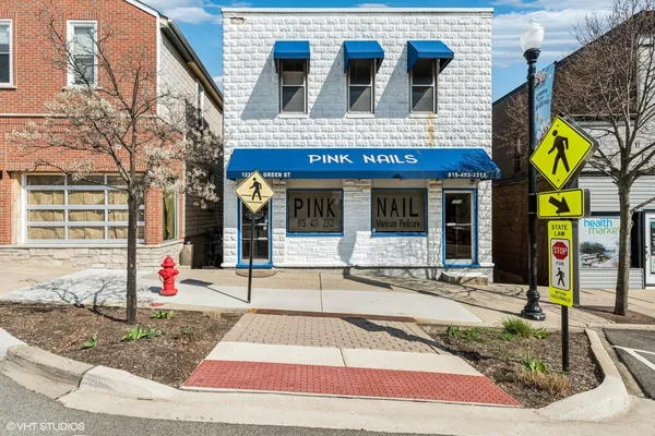 a view of brick building with many windows