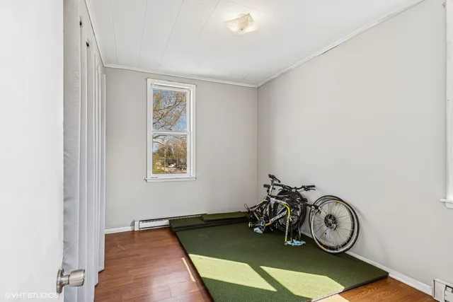 a view of a livingroom with washer and dryer