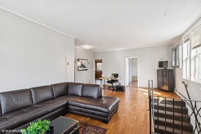 a living room with furniture and a couch