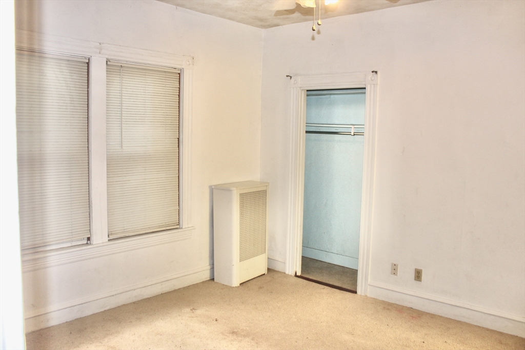 136 Horton Street, Unit 1 Fall River, MA 02723 - Photo 8 of 17 an empty room with closet area