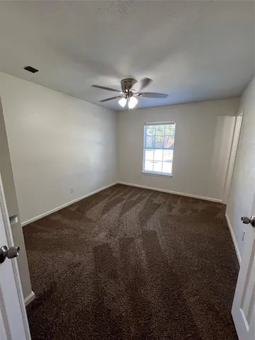 a view of empty room with window