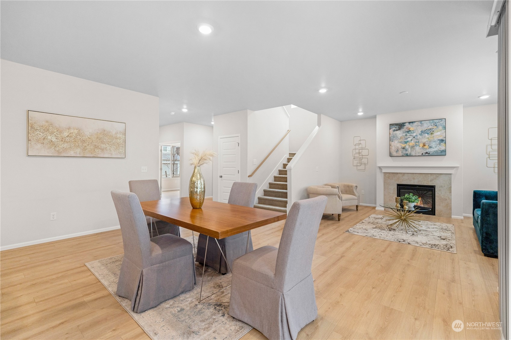 1341 Cascade Street Sultan, WA 98294 - Photo 12 of 39 a living room with furniture a table and a fireplace