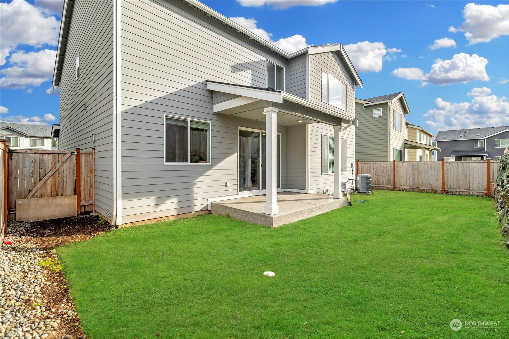 1341 Cascade Street Sultan, WA 98294 - Photo 30 of 39 a view of a house with a yard and sitting area