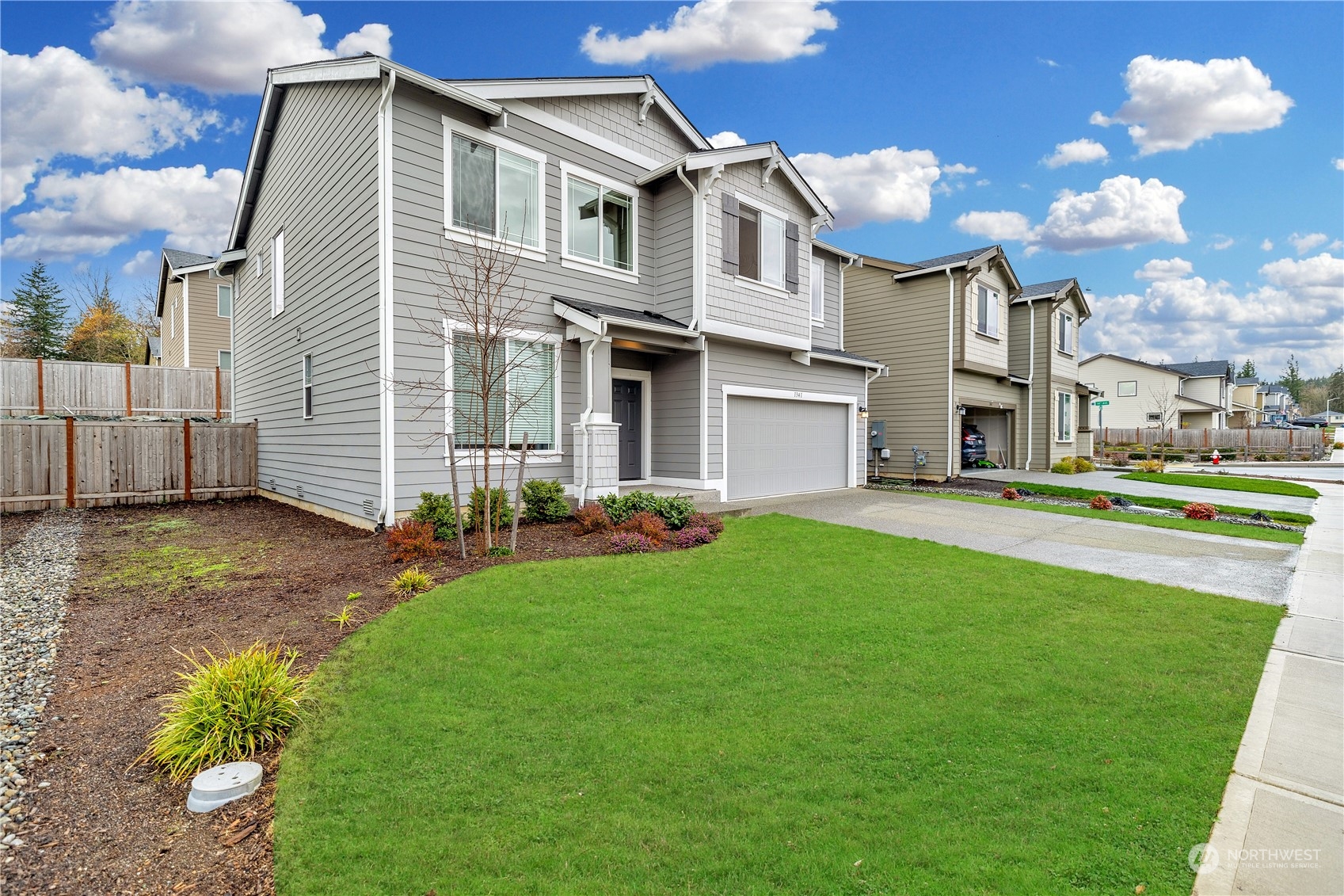 1341 Cascade Street Sultan, WA 98294 - Photo 35 of 39 a front view of a house with a garden