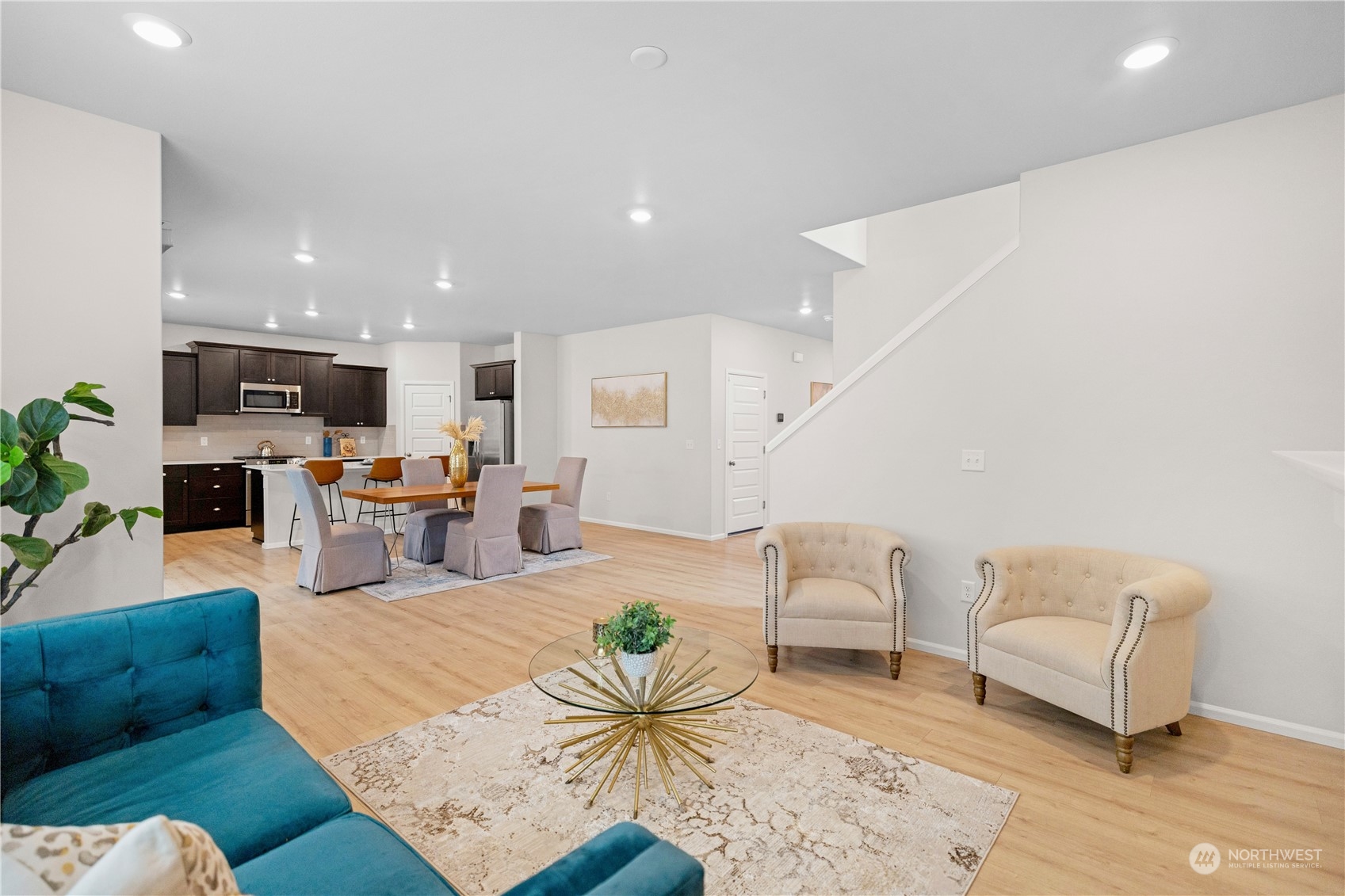 1341 Cascade Street Sultan, WA 98294 - Photo 7 of 39 a living room with furniture kitchen view and a table