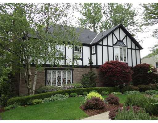 Exterior Front. Lovely Brick Tudor situated on level cul de sac in O Hara s desirous Falconhurst neighborhood
