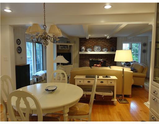 1st Floor Plan. Hardwood floors, convenient built-in cabinetry, log burning fireplace with brick hearth, updated wet bar