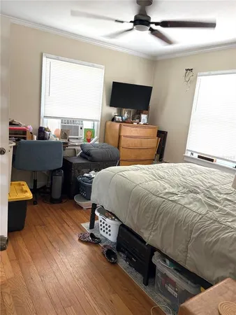 a room with furniture and wooden floor