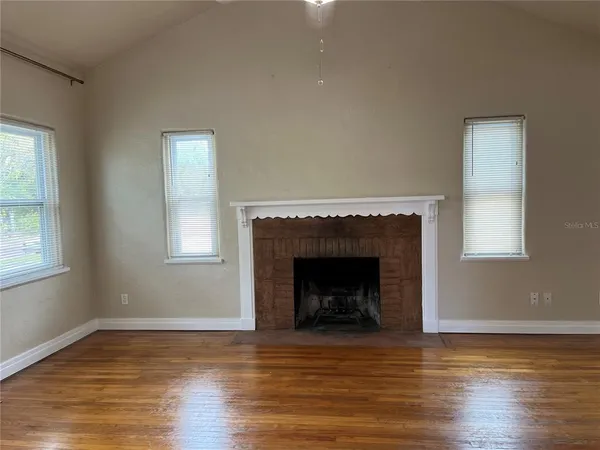 a living room with a fireplace