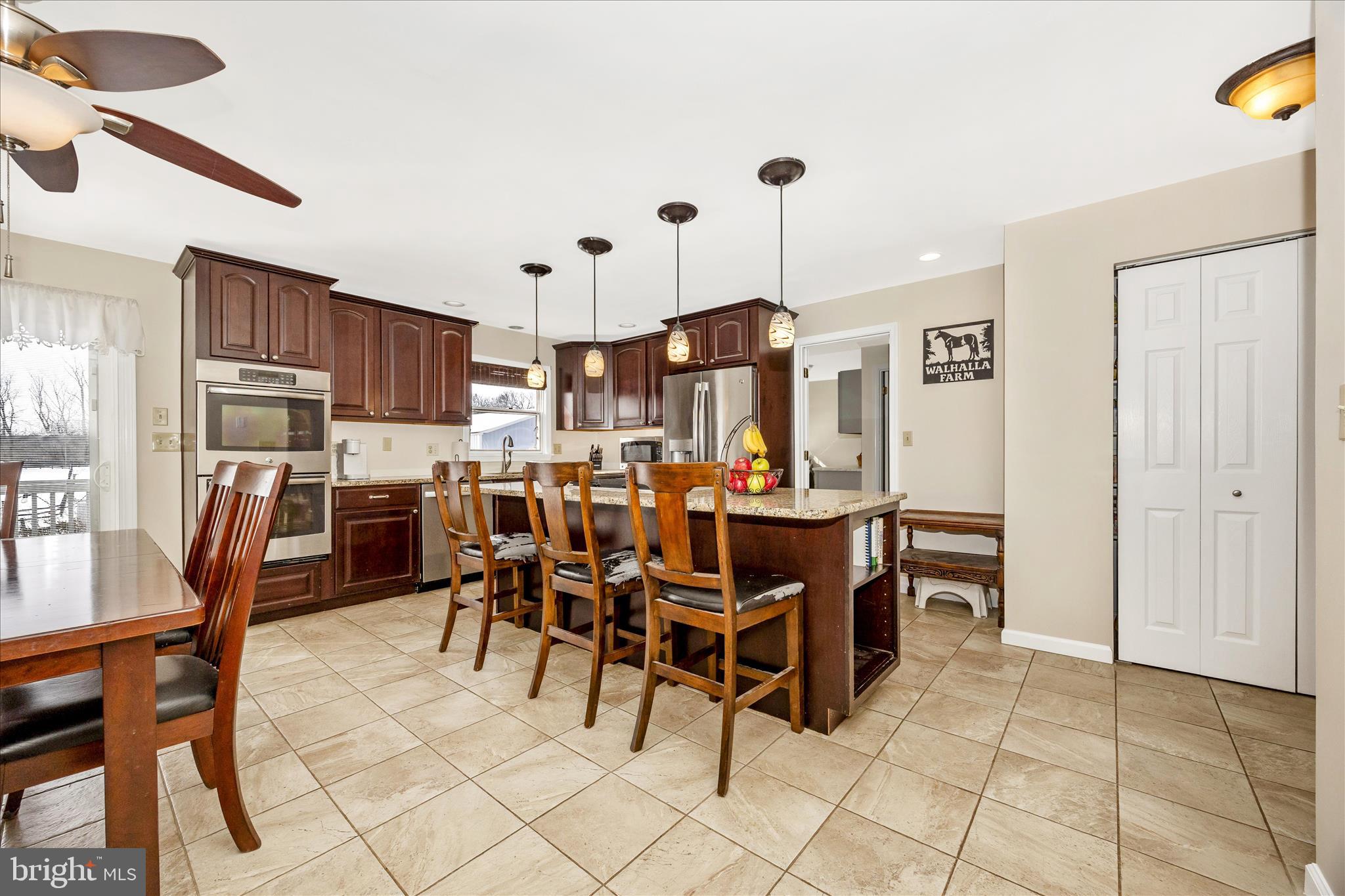 3340 Florence Road Woodbine, MD 21797 - Photo 11 of 61 a view of a dining area with furniture