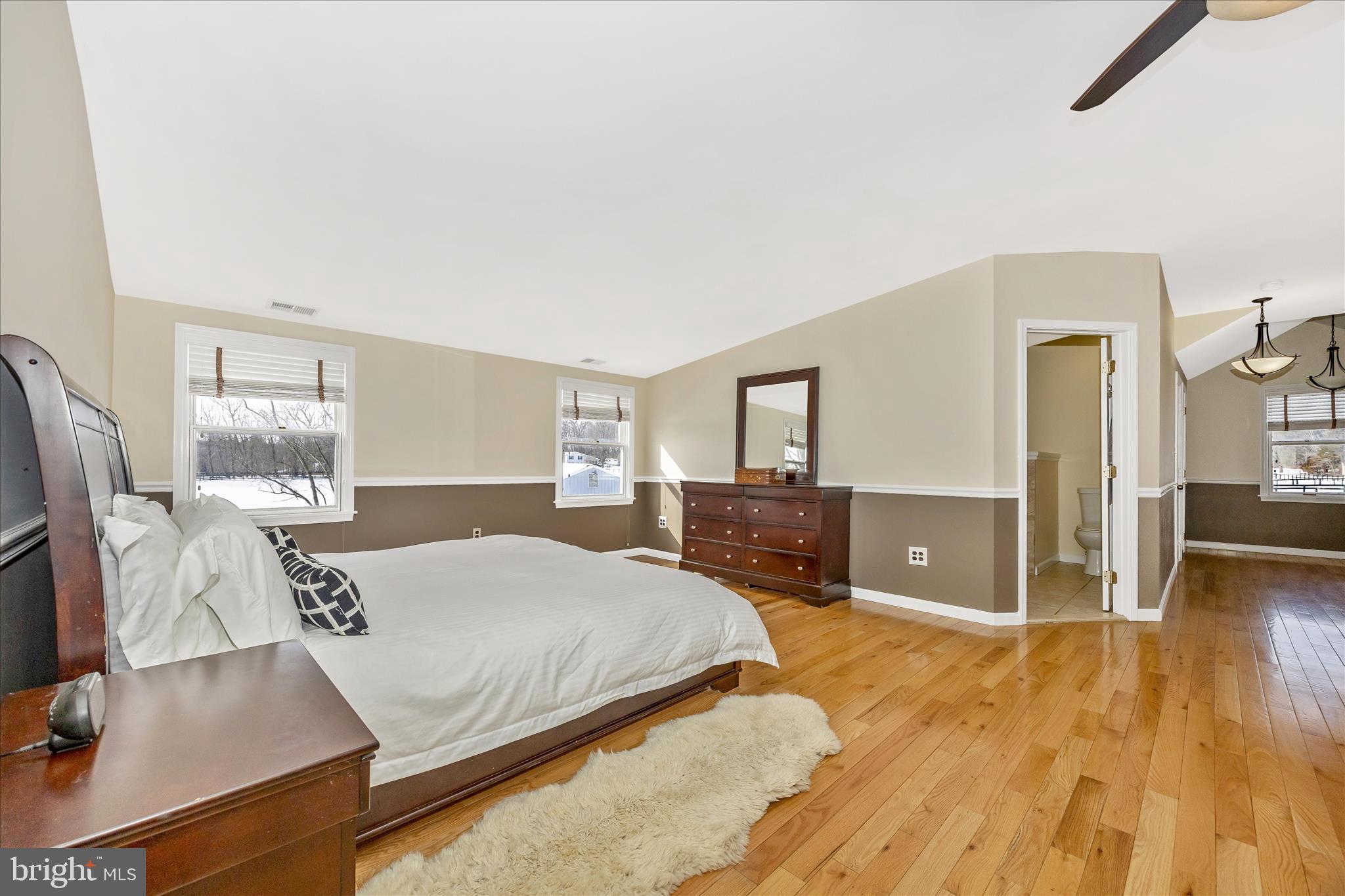 3340 Florence Road Woodbine, MD 21797 - Photo 21 of 61 a bedroom with a bed and wooden floor