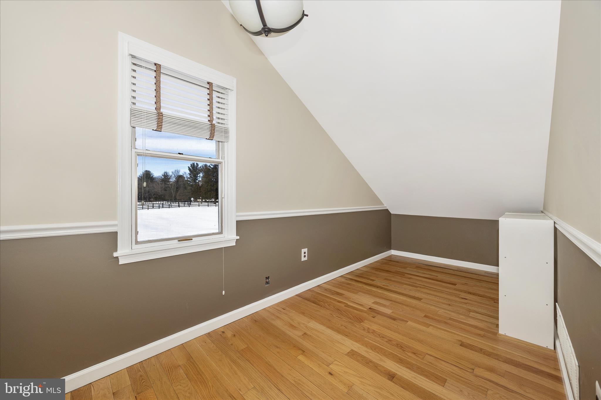 3340 Florence Road Woodbine, MD 21797 - Photo 27 of 61 a view of a room with wooden floor and white walls