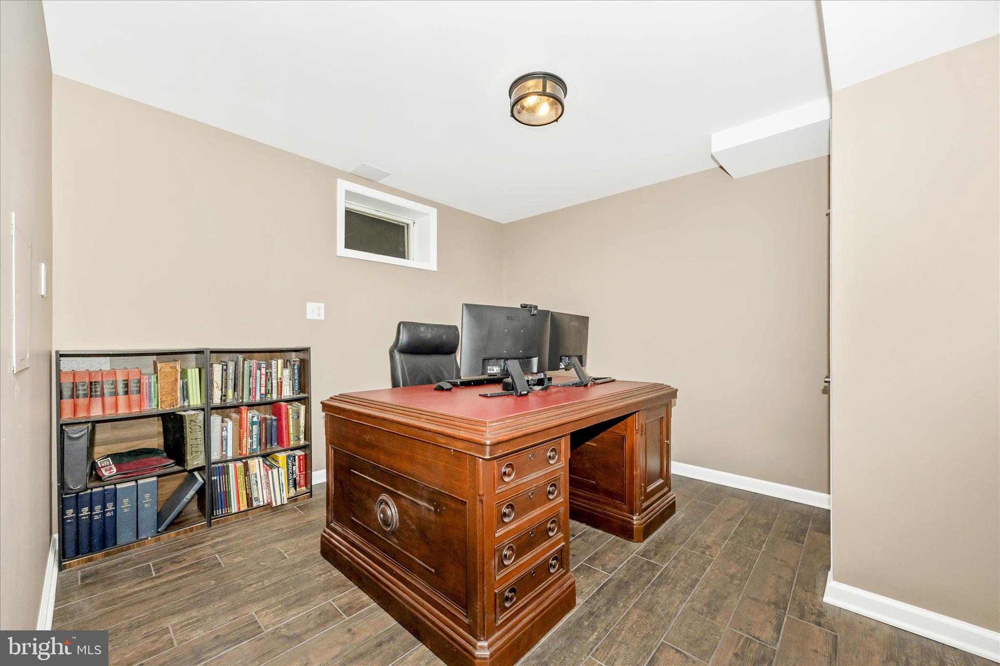 3340 Florence Road Woodbine, MD 21797 - Photo 40 of 61 a room with a bed and a bookshelf