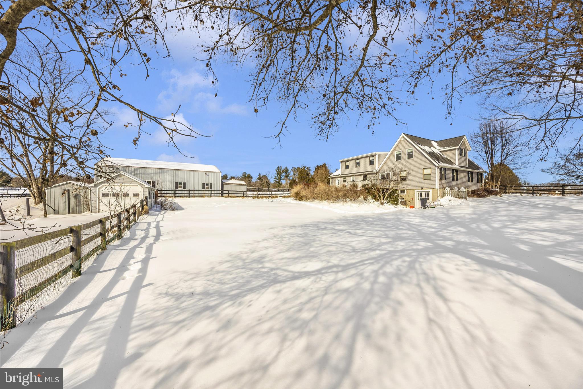 3340 Florence Road Woodbine, MD 21797 - Photo 48 of 61 a view of a large yard with a bench and trees