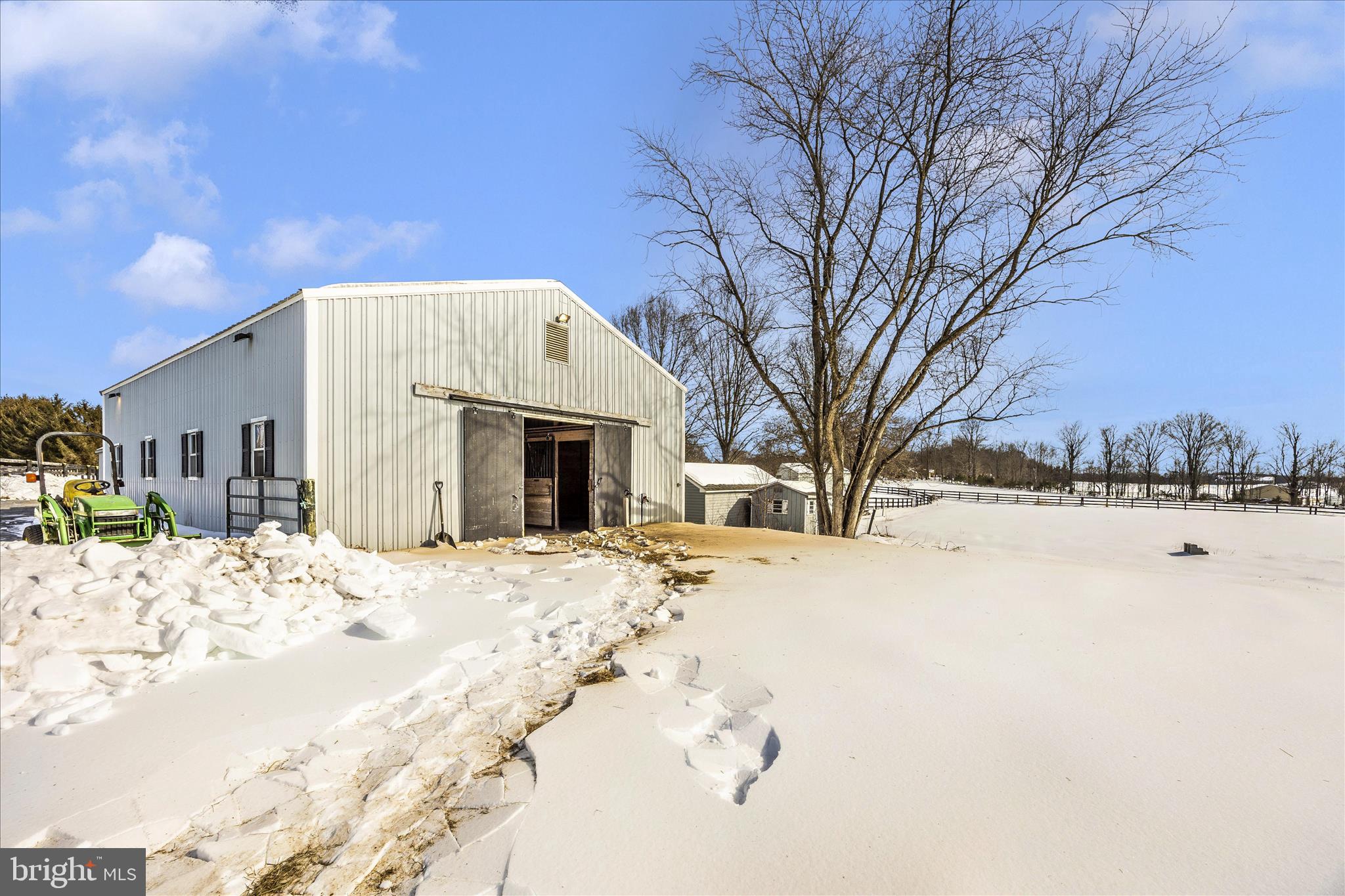 3340 Florence Road Woodbine, MD 21797 - Photo 50 of 61 a view of white house with a yard covered in snow