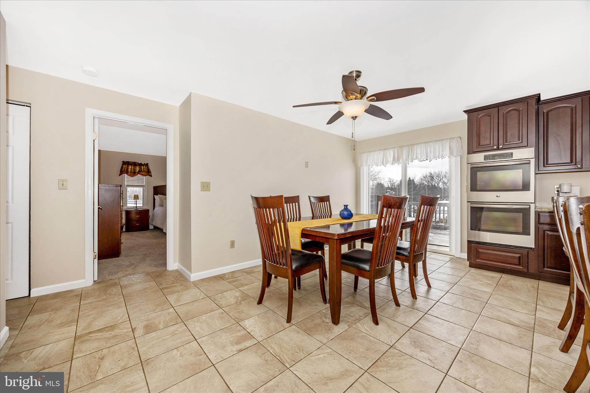 3340 Florence Road Woodbine, MD 21797 - Photo 10 of 61 a view of a dining room with furniture
