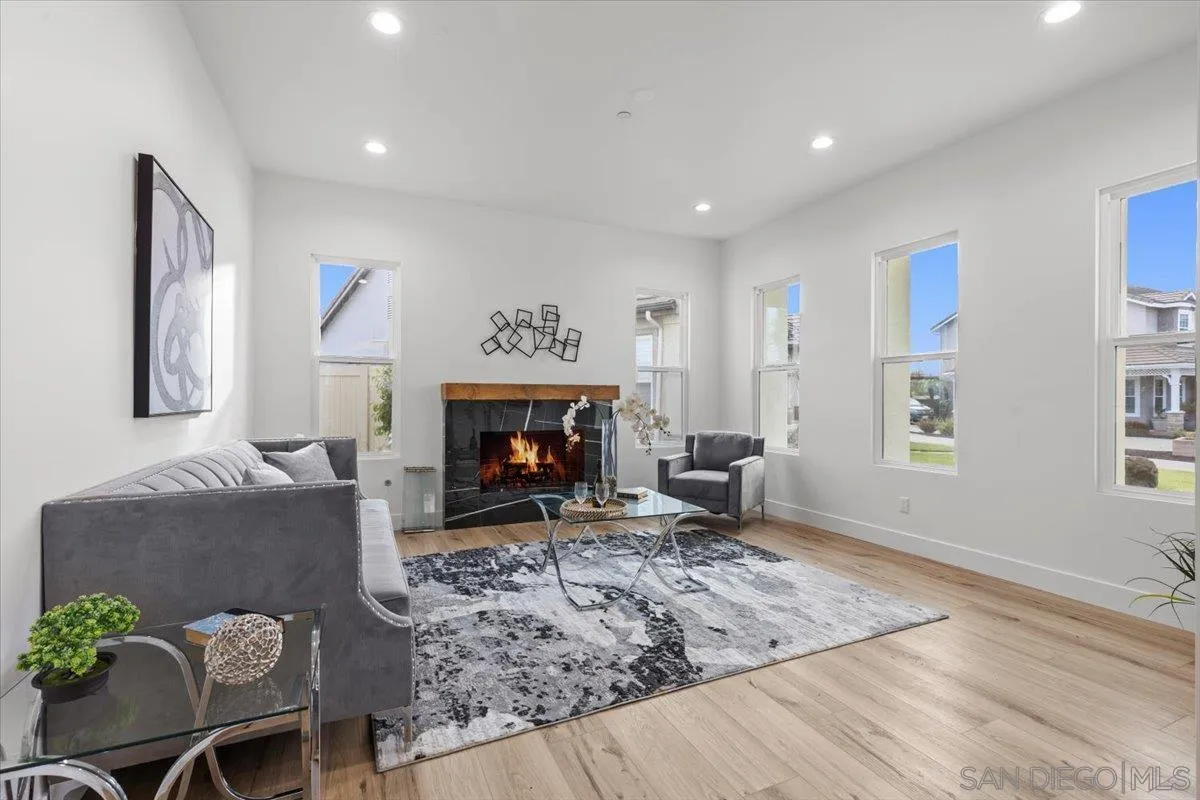 2196 Kirkcaldy Road Fallbrook, CA 92028 - Photo 16 of 57 a living room with furniture and a fireplace