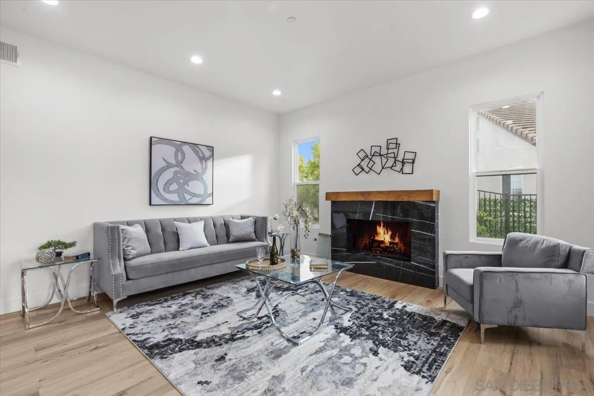2196 Kirkcaldy Road Fallbrook, CA 92028 - Photo 17 of 57 a living room with furniture and a fireplace