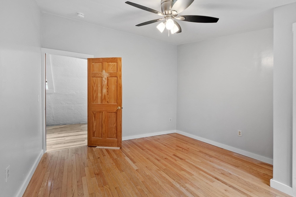258 Allen Road Ashby, MA 01431 - Photo 28 of 36 wooden floor in an empty room with a window