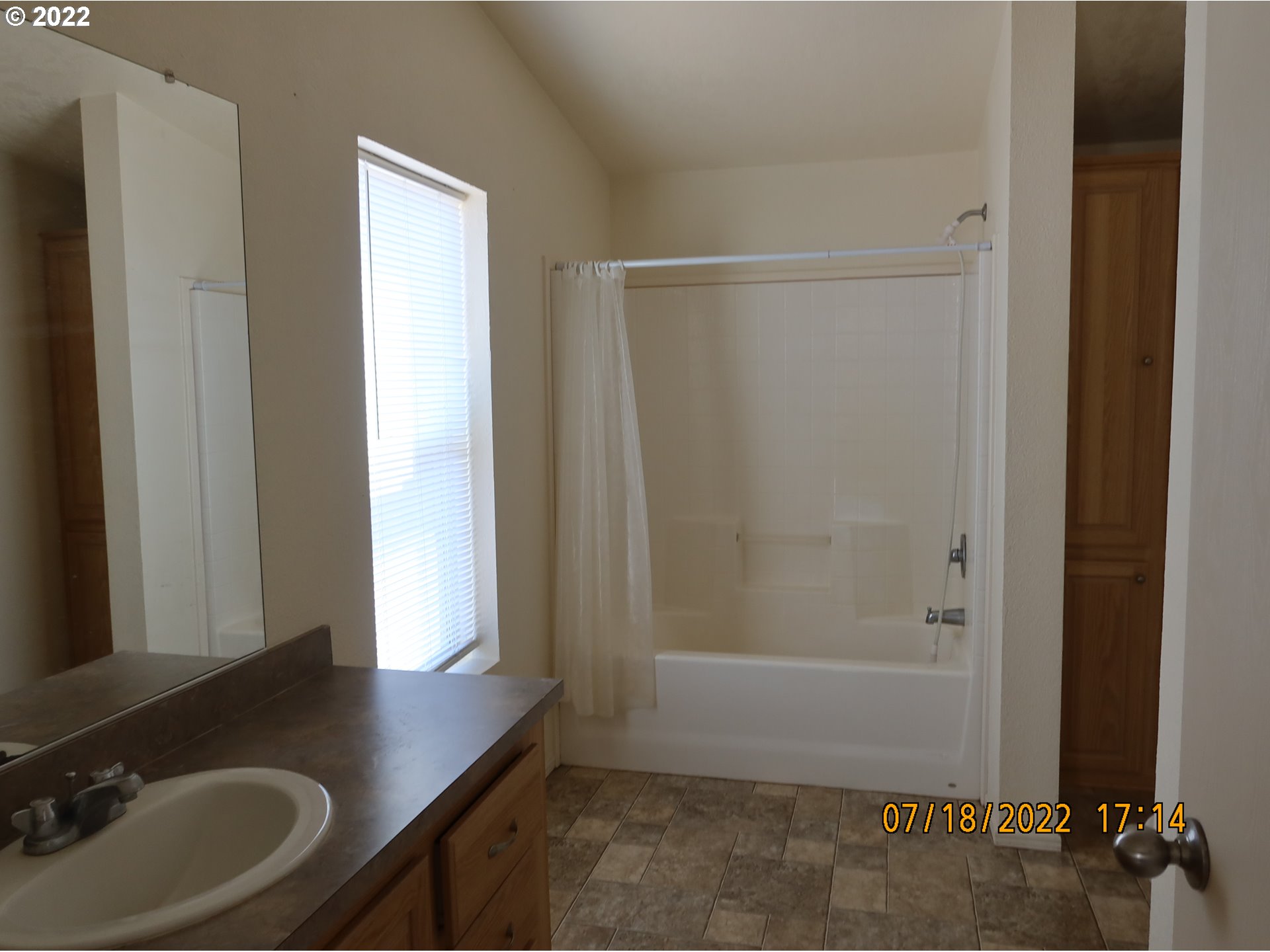 4315 Cordon Road Northeast Salem, OR 97305 - Photo 11 of 11 a bathroom with a granite countertop sink and a mirror