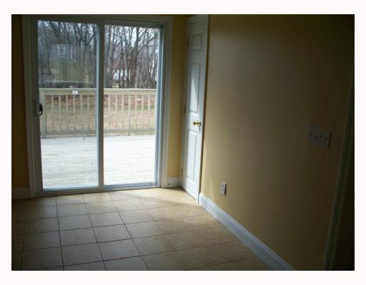 303 Angell Road Lincoln, RI 02865 - Photo 5 of 9 Dining Room. Cheery dinning area leading to huge deck.