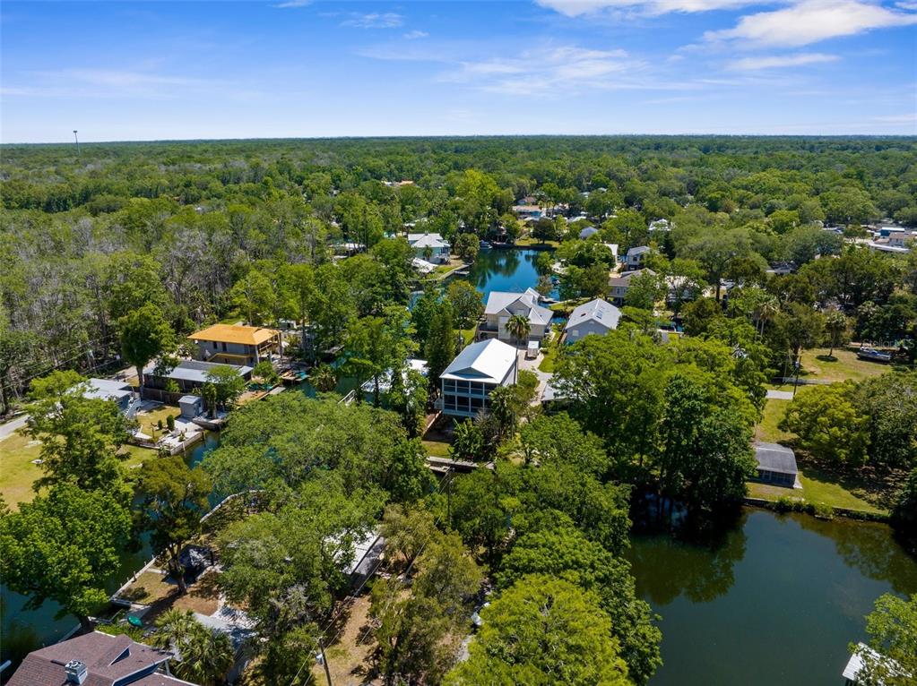 5421 Gay Street Weeki Wachee, FL 34607 - Photo 50 of 55 a view of a lake with houses